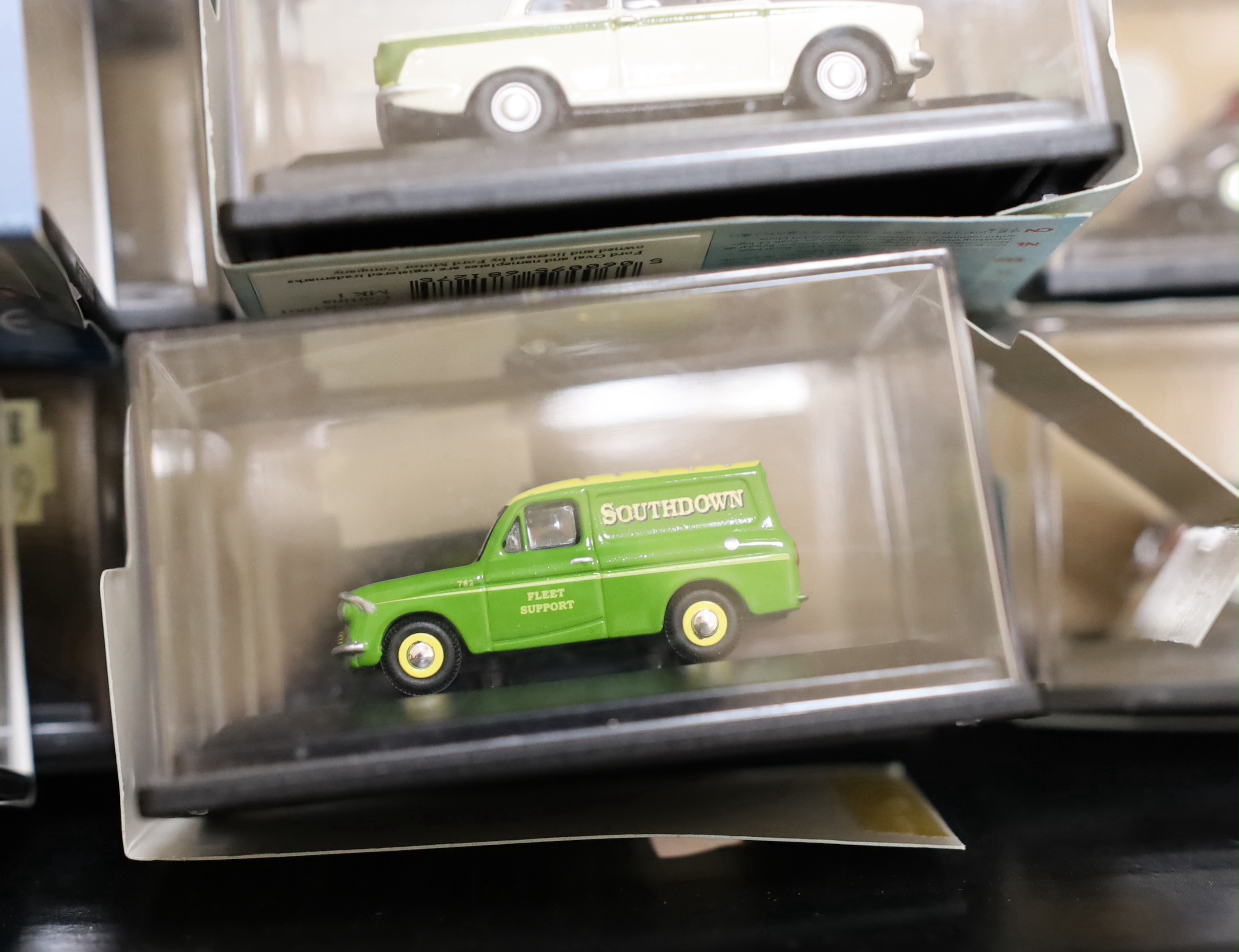 A collection of boxed 00 gauge 1:76 scale vehicles by Oxford Diecast and Corgi, including mainly 1950s/60s/70s cars and light commercial vehicles (54)